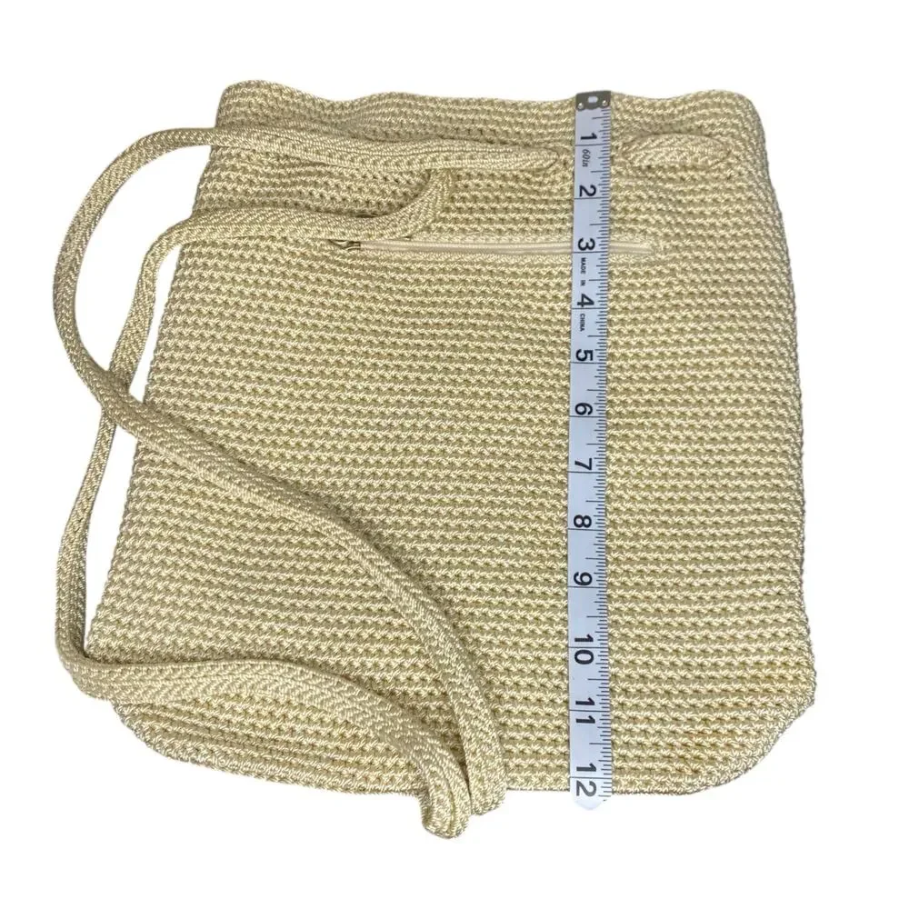 The Sak Creamy White Crochet Knitted Backpack